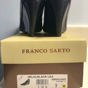 Black wedge pumps by Franco Sarto.